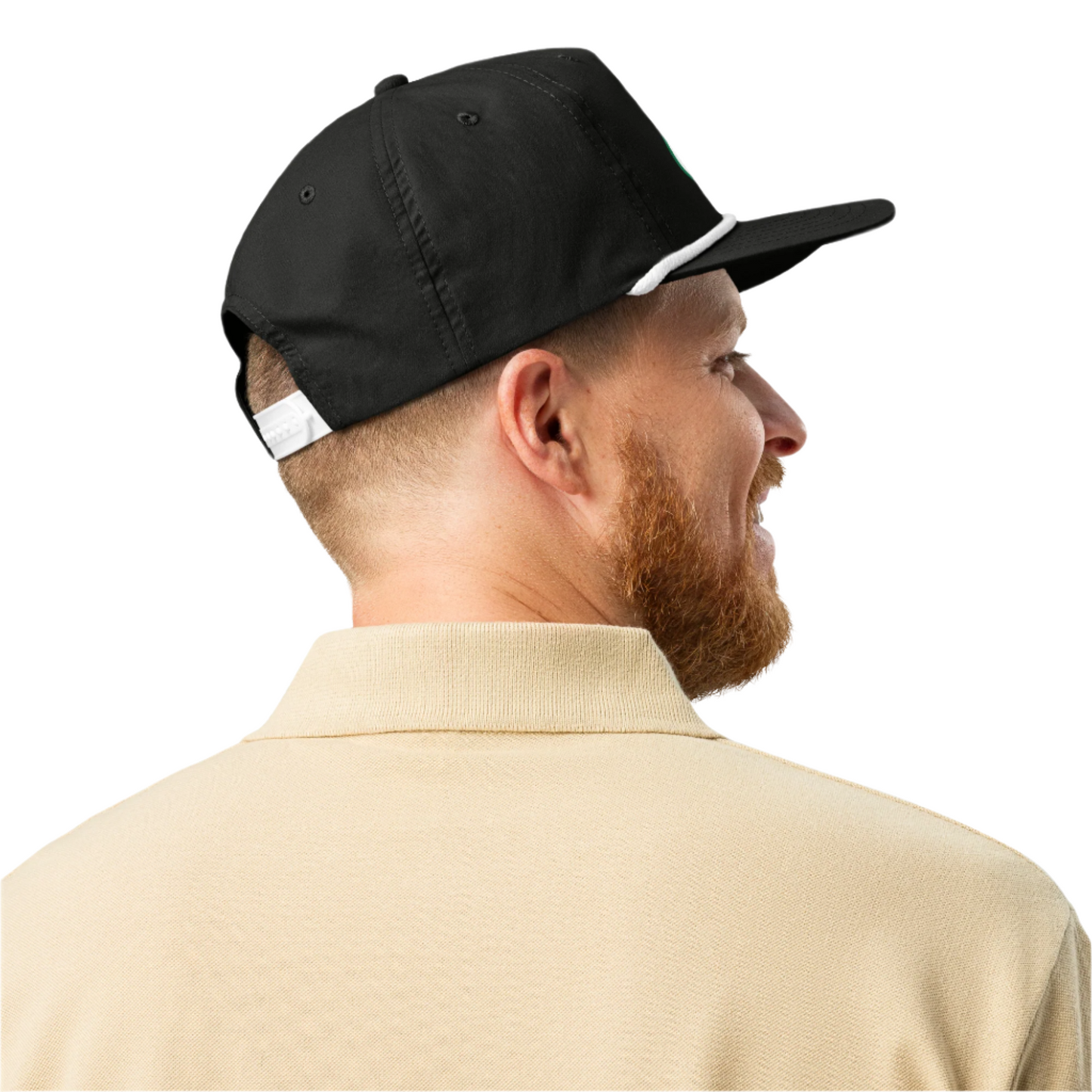 Man wearing a black cap with beige shirt
